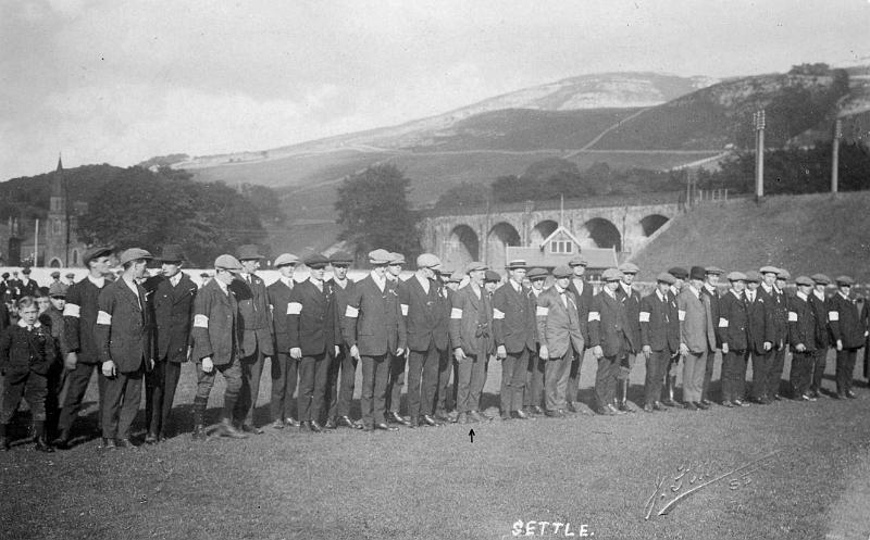 Volunteers 1914-18 War.JPG - Volunteers 1914-18 War  - Taken at Settle Cricket Field  Volunteering into "Tunstils 100 men" - 10th service battalion Duke of Wellingtons Regiment.  -  Harry Metcalfe ( William Henry ) is arrowed.